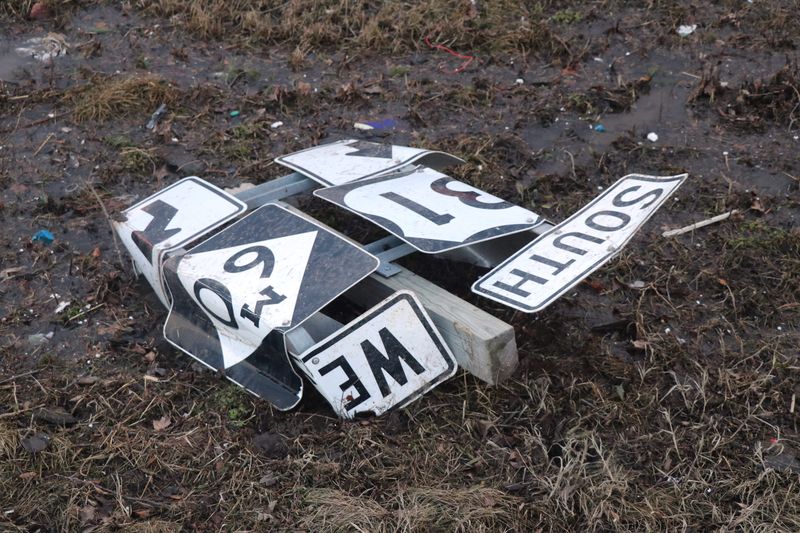 The remains of a highway directional sign lay in the median along U.S. 131 near Broadway Street in Three Rivers.