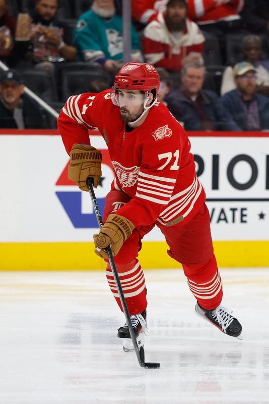 Mar 6, 2026; Detroit, Michigan, USA; Detroit Red Wings center Dylan Larkin (71) skates with the puck in the second period against the Florida Panthers at Little Caesars Arena. Mandatory Credit: Rick Osentoski-Imagn Images