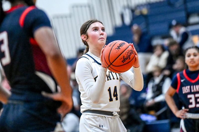 DeWitt's Sophia Beland shoots a free throw against East Lansing during the fourth quarter on Friday, March 6, 2026, at Grand Ledge High School.