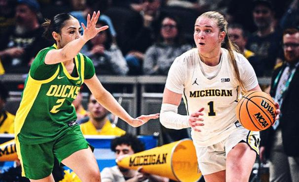 Michigan's Olivia Olson, right, scored 16 points in 80-58 win over Oregon at Gainbridge Fieldhouse in the Big Ten Tournament’s late quarterfinal Friday night in Indianapolis.