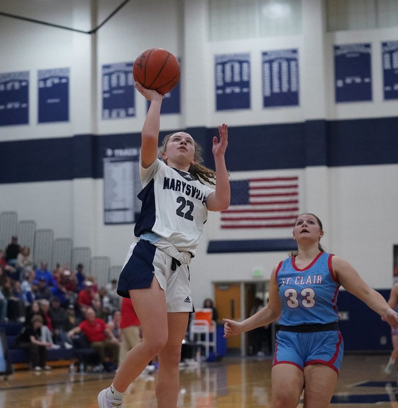 Marysville's Harper Sharrow goes for layup during a Division 2 district final against St. Clair at Marysville High School on Friday, March 6, 2026.