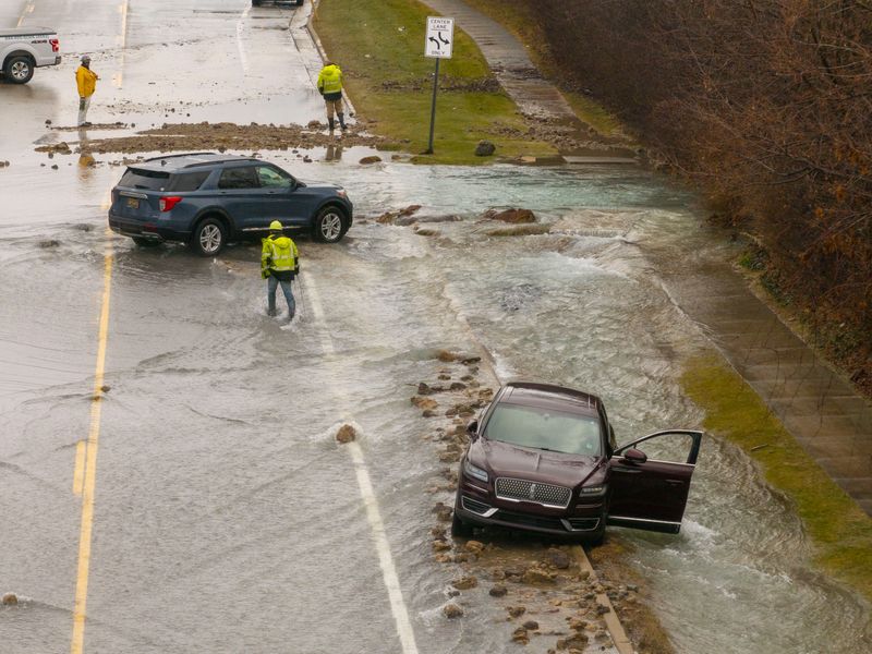 GLWA responds to a water main break on 14 Mile, west of Drake Road, in Farmington Hills March 7, 2026.