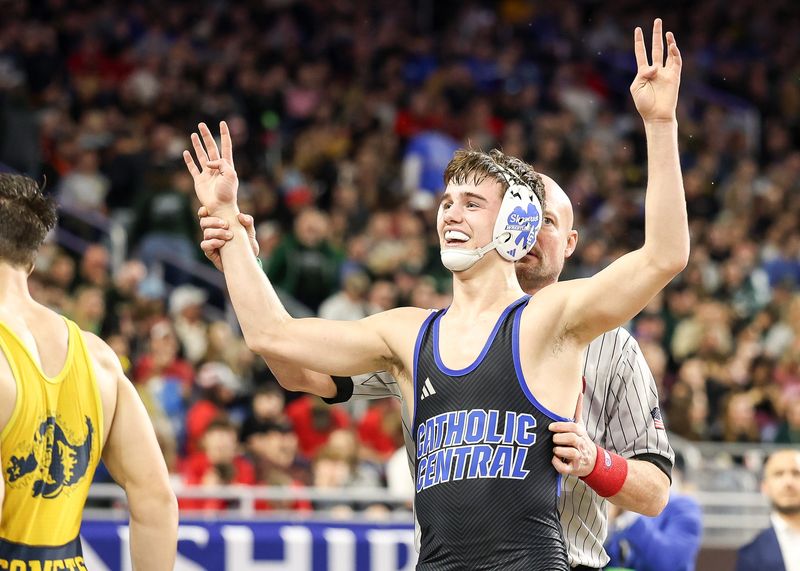 Detroit Catholic Central's Wyatt Lees celebrates a win during the Division individual boys wrestling state finals on Saturday, March 7, 2026, at Ford Field in downtown Detroit.