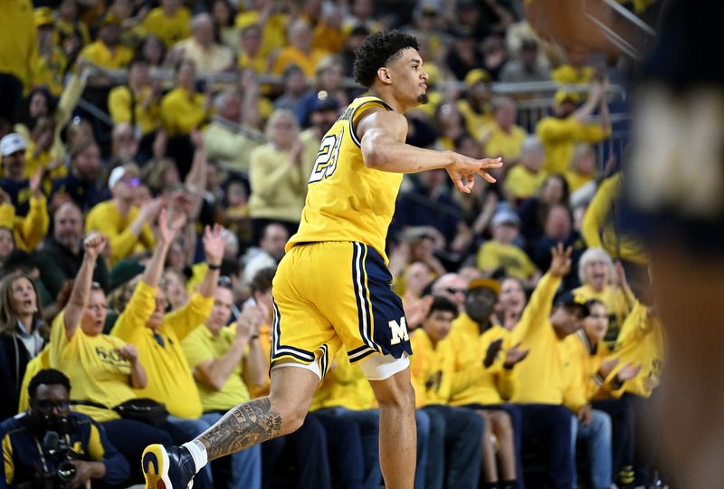 Michigan forward Yaxel Lendeborg (23) reacts after making one of his five 3-pointers in Sunday's regular-season finale win over Michigan State.
