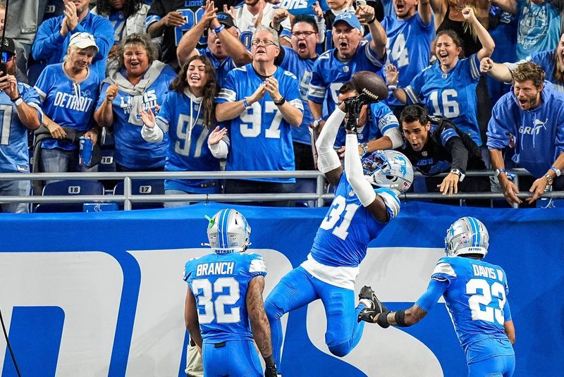 Detroit Lions safety Kerby Joseph (31) celebrates an interception against Los Angeles Rams during the first half at Ford Field in Detroit on Sunday, September 8, 2024.