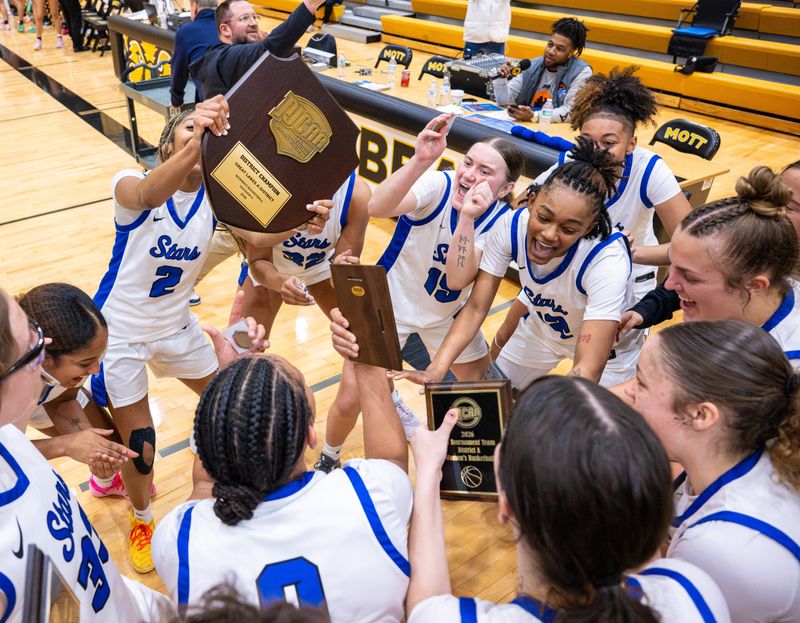 The LCC Women's Basketball teram celebrates their NJCAA Region 12 District A Championship Sunday, March 8, 2026, at Steve Schmidt Gymnasium in Ballenger Fieldhouse at Mott Community College. The Stars will advance to the NJCAA national tournament for the first time in 30 years.