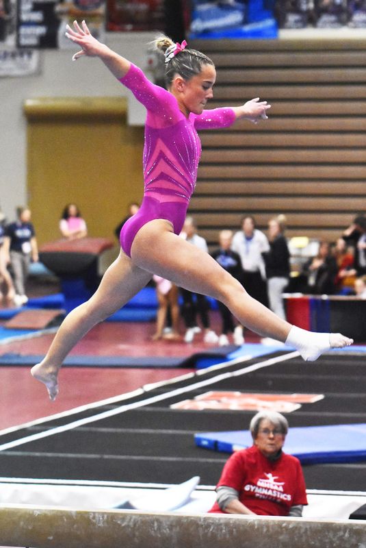 Hartland's Lexi Fundich finished first all around during the MHSAA gymnastics individual championships on Saturday, March 7, 2026 at Milford High School.