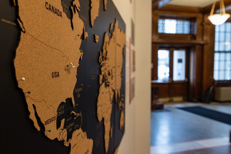A map inside Holland Museum invites visitors to mark their family’s place of origin for "We The People: America250."
