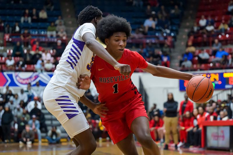 Roseville’s Carter George dribbles down the court during the team’s state quarterfinal against Avondale on Tuesday, March 10, 2026 at the University of Detroit Mercy.