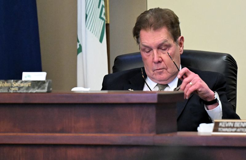 Plymouth Township Trustee John Stewart, seen here during a March 10, 2026, board meeting, is described by colleagues and acquaintances as a colorful local politician, bordering on corny, who has a penchant for melodrama. He's known speaking theatrically during township board meetings, which have gotten contentious between Stewart and fellow board members.