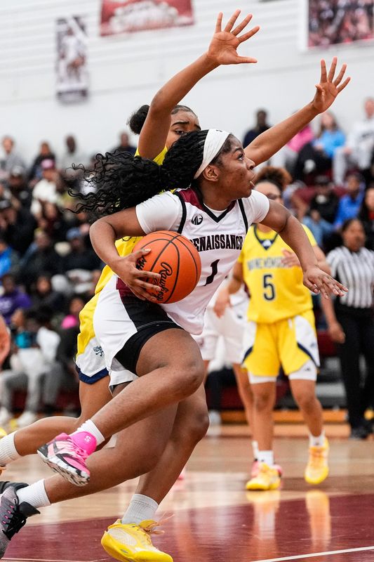 Renaissance's Maria Walker drives to basket against Wayne Memorial during the first half of Division 1 regional final at Renaissance High School in Detroit on Wednesday, March 11, 2026.