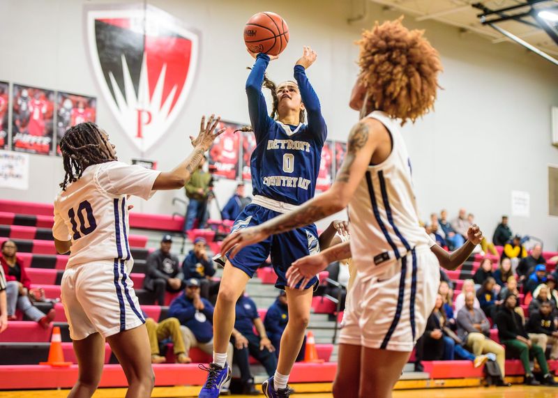 Detroit Country Day's Naiya Krispin shoots during the Division 2 girls basketball regional final on Wednesday, March 11, 2026, at Detroit Edison Public School Academy.