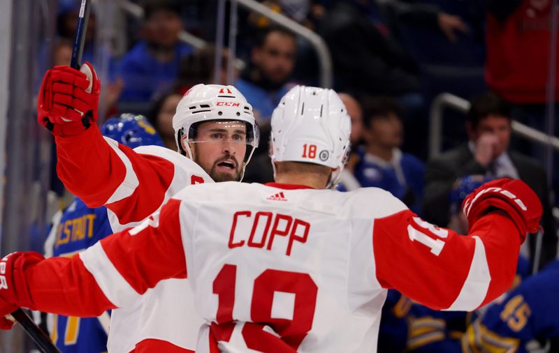 Oct 31, 2022; Buffalo, New York, USA; Detroit Red Wings center Dylan Larkin (71) celebrates his goal with center Andrew Copp (18) against the Buffalo Sabres at KeyBank Center. Mandatory Credit: Timothy T. Ludwig-USA TODAY Sports