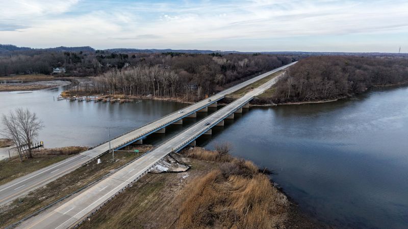 Remnants of spilled plastic lie along Northbound I-196 at the overpass of the Kalamazoo River between exits 36 and 41 in Saugatuck on March 12, 2026. Once they get into the environment, plastic particles are difficult to remove.