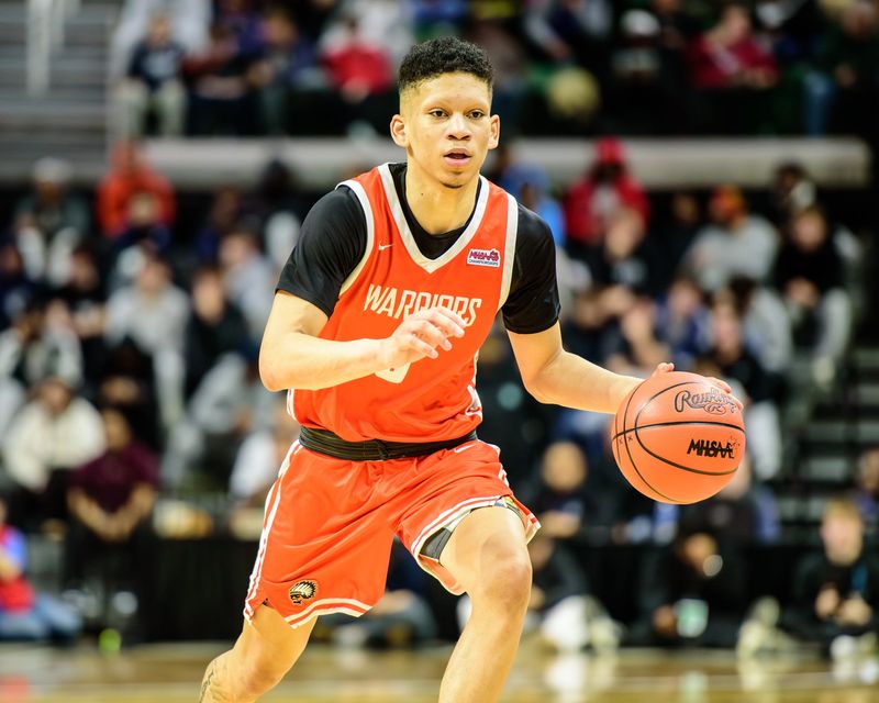 Brother Rice's Jacob Lamb dribbles during the Division 1 boys basketball state semifinal on Friday, March 13, 2026, at Michigan State University.