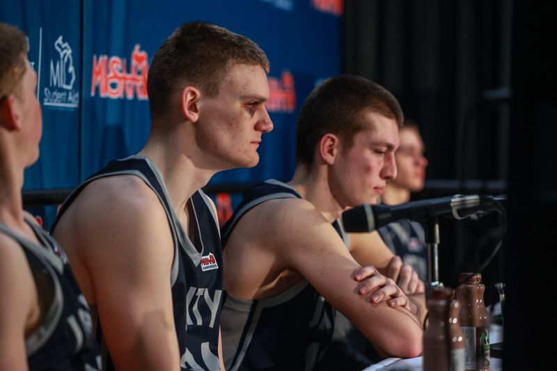 Unity Christian's Luke Tubergen and Owen Vanderwaal talk after the Division 2 state semifinals on Friday, March 13, at the Breslin Center in East Lansing.