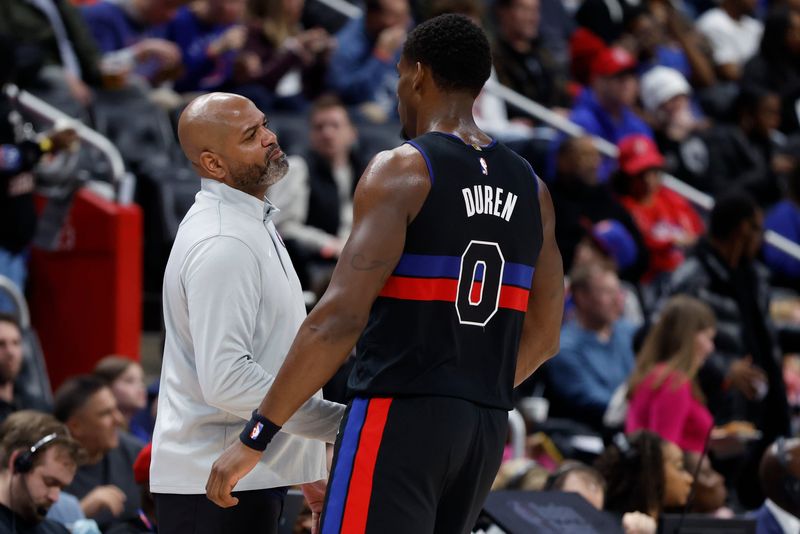 Detroit Pistons head coach J.B. Bickerstaff talks to center Jalen Duren (0) in the second half against the Memphis Grizzlies at Little Caesars Arena in Detroit on Friday, March 13, 2026.