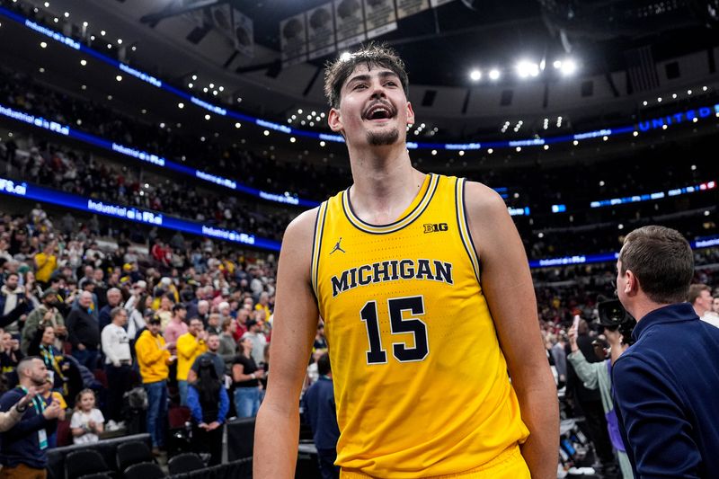 Michigan center Aday Mara (15) celebrates 68-65 win over Wisconsin at the Big Ten Tournament semifinal at United Center in Chicago on Saturday, March 14, 2026.