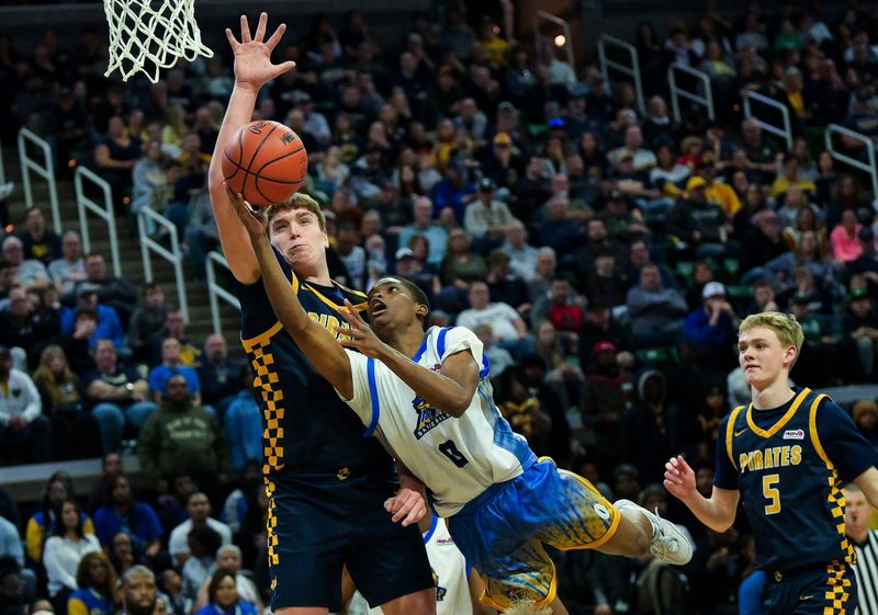 Pontiac A&T's Lewis Lovejoy takes a shot while Pewamo-Westphalia's Trent Piggott guards him during Pewamo-Westphalia’s 61-57 Div. 3 state final victory on Saturday, March 14, 2026 at the Breslin Center in East Lansing.