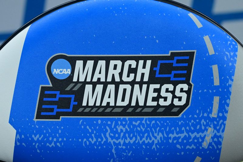 Mar 21, 2025; Cleveland, OH, USA; General view of the “March Madness” logo prior to the game between the Robert Morris Colonials and the Alabama Crimson Tide during the NCAA Tournament First Round at Rocket Arena. Mandatory Credit: Ken Blaze-Imagn Images