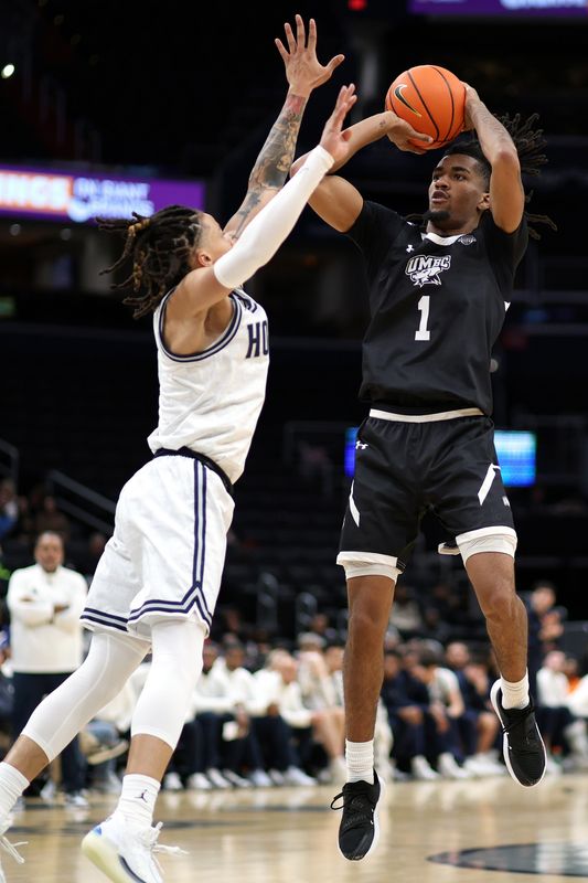 Dec 2, 2024; Washington, District of Columbia, USA; UMBC Retrievers guard Ace Valentine (1) shoots the ball as Georgetown Hoyas guard Malik Mack (2) defends during the second half at Capital One Arena. Mandatory Credit: Daniel Kucin Jr.-Imagn Images