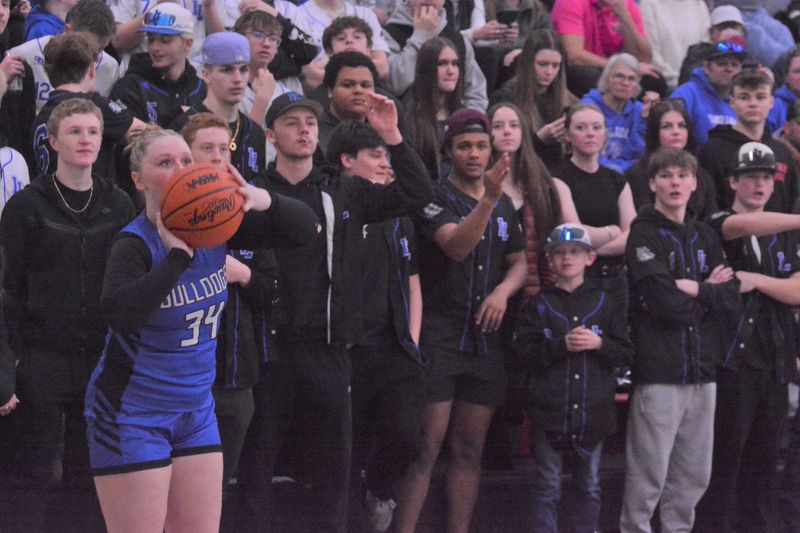 Inland Lakes senior Molly Monthei (34) gets ready to shoot a 3-pointer during the second half of an MHSAA Division 4 girls basketball regional final against Newberry on Saturday, March 14.