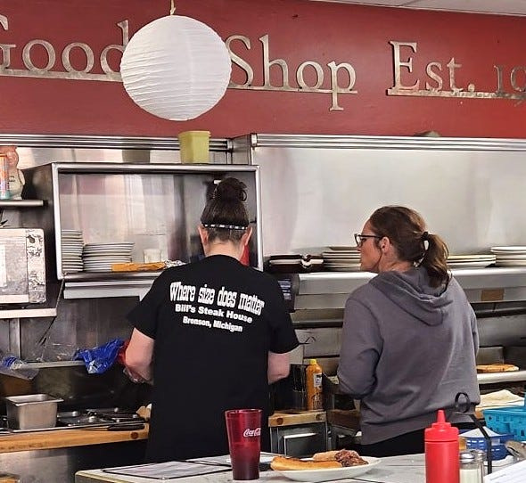 Veronica Carter manned the grill on Sunday, March 15, the last day the Goodie Shop served breakfast under her ownership waiting for the new owner to take over soon.