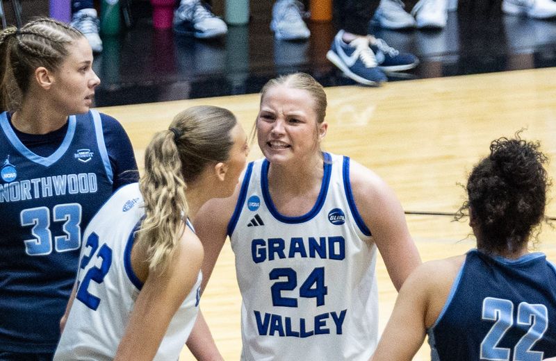 GVSU's Paige VanStee, center, reacts after a basket by Ava Scanlon. The Lakers reached the Final Four for the second year i a row.