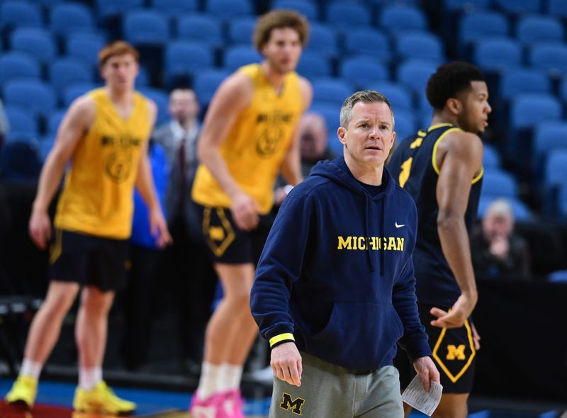 University of Michigan coach Dusty May on the court during a practice session at the 2026 Men's Basketball Championship, first and second rounds, in Buffalo, New York on March 18, 2026.