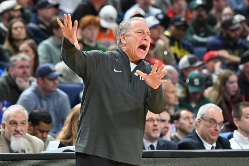 Mar 19, 2026; Buffalo, NY, USA; Michigan State Spartans head coach Tom Izzo calls a play during the first half against the North Dakota State Bison during a first round game of the men's 2026 NCAA Tournament at Keybank Center. Mandatory Credit: Mark Konezny-Imagn Images