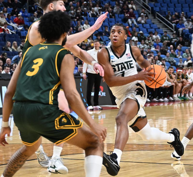 Jeremy Fears Jr., right, has until May 27 to decide whether to stay in the NBA Draft or return to Michigan State.