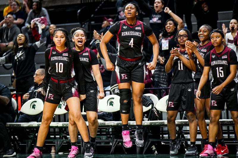 Detroit Renaissance celebrates a score against DeWitt during the third quarter in the Division 1 girls basketball state semifinal on Friday, March 20, 2026, at the Breslin Center in East Lansing.