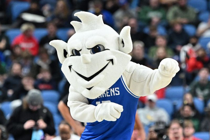 Saint Louis Billikens mascot The Billiken performs during the second half of a first round game of the men's 2026 NCAA Tournament against the Georgia Bulldogs at Keybank Center.