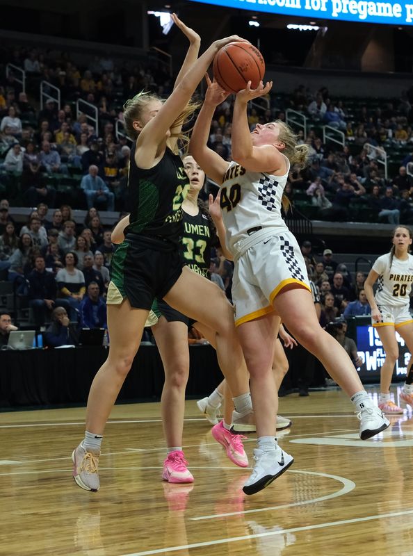 Pewamo-Westphalia's Alonna Thelen (40) is guarded by Jackson Lumen Christi's Ruby Boyce (20) in first half action for the D3 State Championship at the Breslin Center Saturday, March 21, 2026.