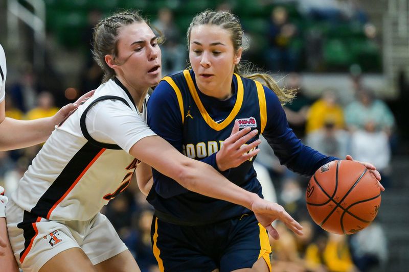 Goodrich's Baylor Lauinger dribbles down the court while Tecumseh's Chloe Bullinger guards her during Goodrich’s 55-44 Div. 2 state final victory on Saturday, March 21, 2026 at the Breslin Center in East Lansing.