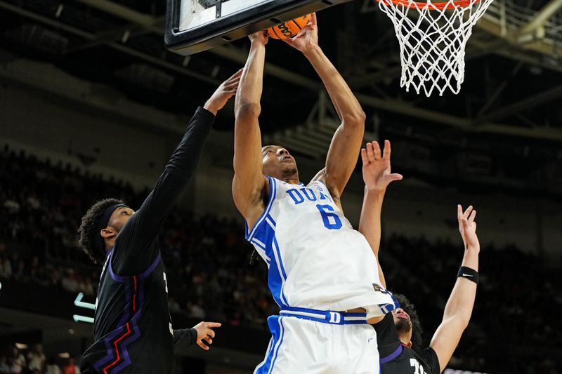 Duke Blue Devils forward Maliq Brown (6) goes for a layup during the second half against the Texas Christian University Horned Frogs.