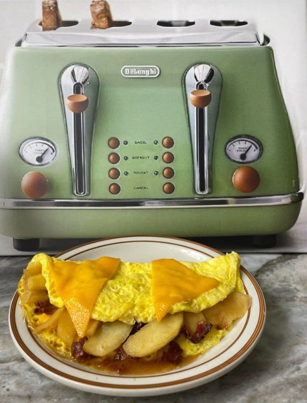 At The Toast Office in Carleton, an apple pie omelet stuffed with bacon and cheddar cheese is offered as a special of the day.