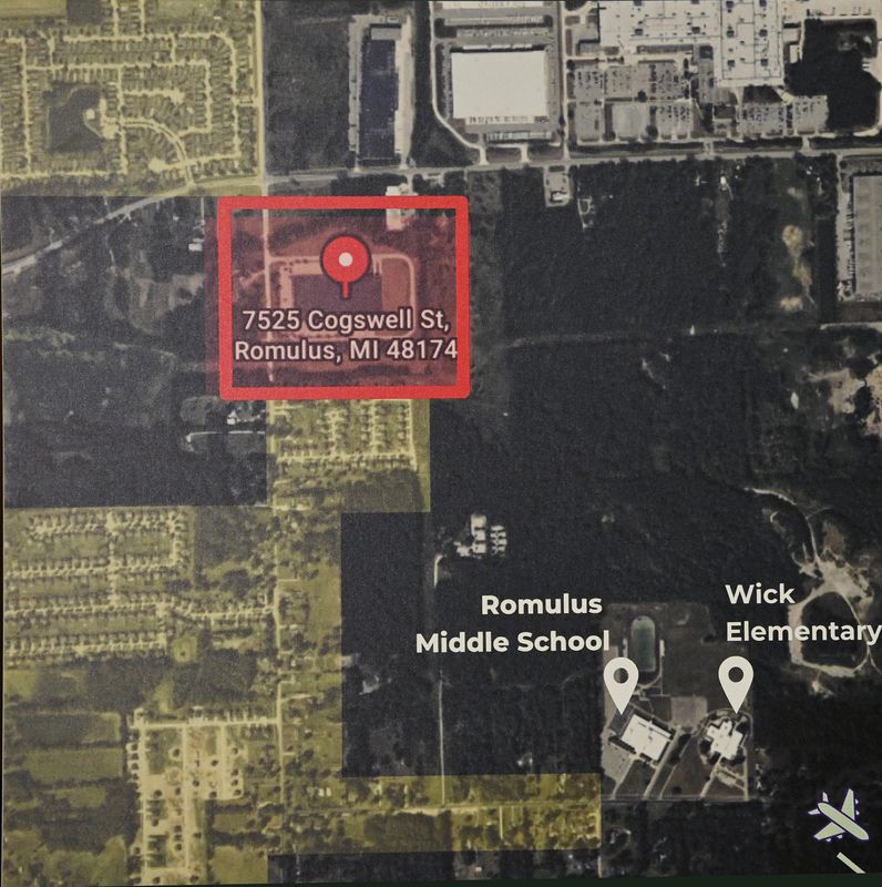 A map showing the proposed ICE detention center and its proximity to Romulus Middle School and Wick Elementary School during a press conference at Romulus City Hall to announce a lawsuit challenging ICE’s conversion of the warehouse to a detention center on Tuesday, March 24, 2026, in Romulus, Mich.