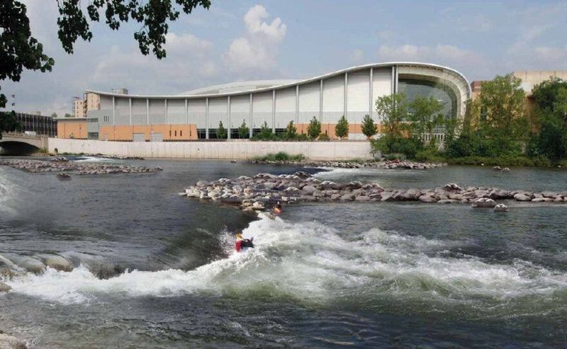 A rendering portrays what the restoration of rapids on the Grand River in downtown Grand Rapids could look like, with the view near the Gerald R. Ford Museum.