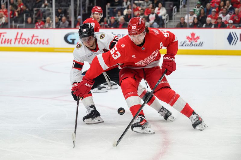 Detroit defenseman Moritz Seider keeps Ottawa center Tim Stützle away from the puck during the second period of a game between the Detroit Red Wings and the Ottawa Senators at Little Caesars Arena, in Detroit, March 24, 2026.