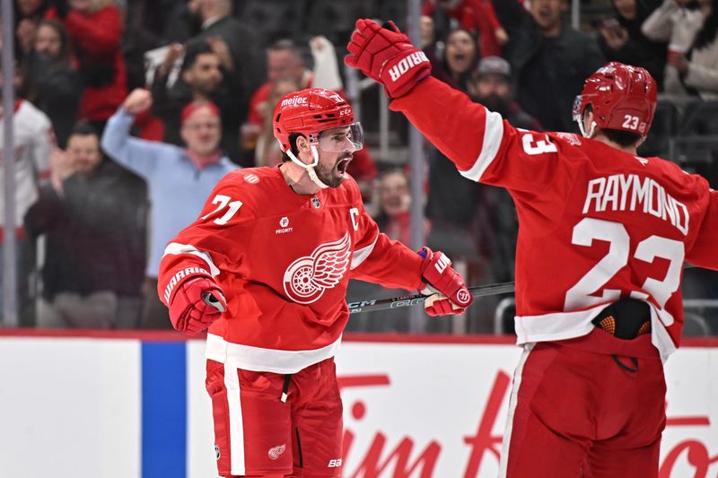 Red Wings captain Dylan Larkin celebrates his third-period goal against the Senators on Tuesday at Little Caesars Arena.