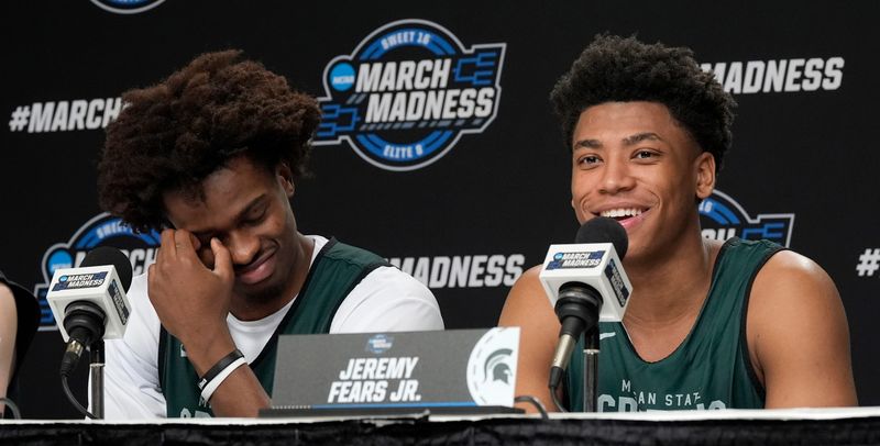(L to R) Michigan State basketball players Coen Carr and Jeremy Fears Jr. have a laugh talking about their coach Tom Izzo during a press conference at Capital One Arena in Washington DC on Thursday, March 26, 2026. 
The Spartans play the University of Connecticut on Friday evening.