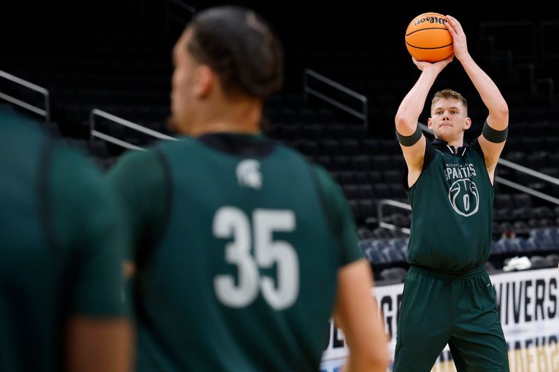 Mar 26, 2026; Washington, DC, USA; Michigan State Spartans forward Jaxon Kohler (0) shoots during a practice session ahead of the east regional of the men's 2026 NCAA Tournament at Capital One Arena. Mandatory Credit: Geoff Burke-Imagn Images