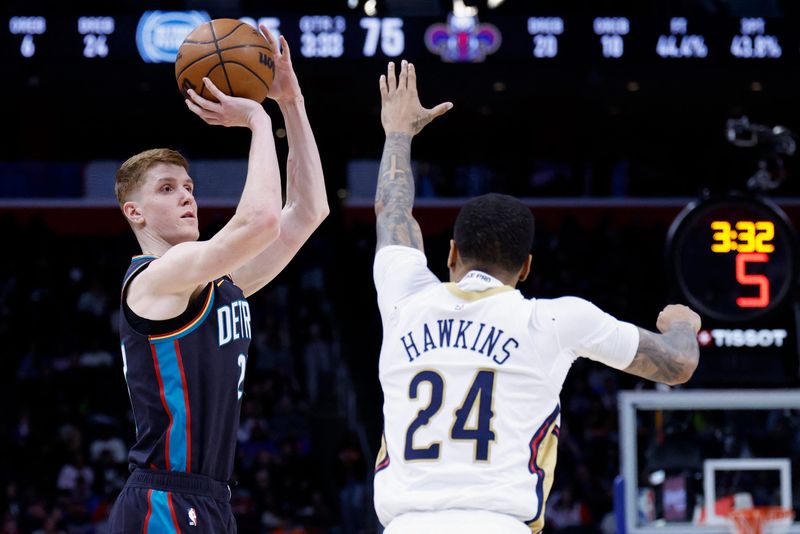 Pistons guard Kevin Huerter (27) shoots on Pelicans guard Jordan Hawkins (24) in the second half at Little Caesars Arena.