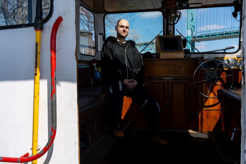 Jimmy Hogan, 42, vice-president and captain of the J.W. Westcott Co., sits aboard the M.S. Westcott, along the Detroit River in Detroit on Friday, March 27, 2026.
