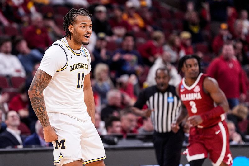 Michigan guard Roddy Gayle Jr. (11) celebrates a play against Alabama during the first half of NCAA Tournament Sweet 16 round at United Center in Chicago on Friday, March 27, 2026.