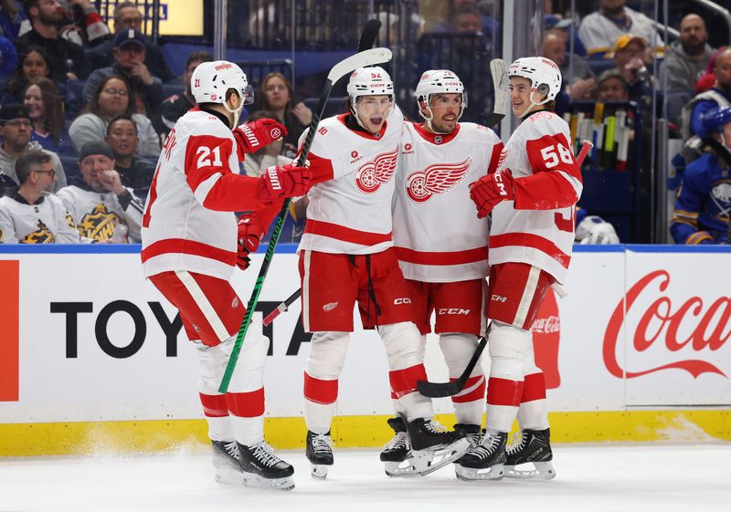 Mar 27, 2026; Buffalo, New York, USA; Detroit Red Wings center Marco Kasper (92) celebrates his goal with teammates during the first period against the Buffalo Sabres at KeyBank Center. Mandatory Credit: Timothy T. Ludwig-Imagn Images