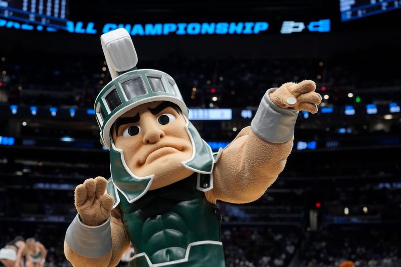 Sparty directs the Michigan State band during a time out in the second half of the 2026 NCAA Men's Basketball East Regional game against UConn at Capital One Arena in Washington DC on Friday, March 27, 2026. 
Michigan State lost the game 67-63.