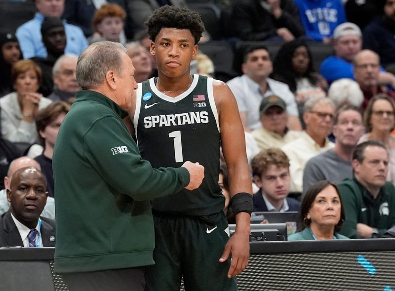 Michigan State coach Tom Izzo talks with guard Jeremy Fears Jr. (1) during the second half of the 2026 NCAA Men's Basketball East Regional game against UConn at Capital One Arena in Washington DC on Friday, March 27, 2026. 
Michigan State lost the game 67-63.