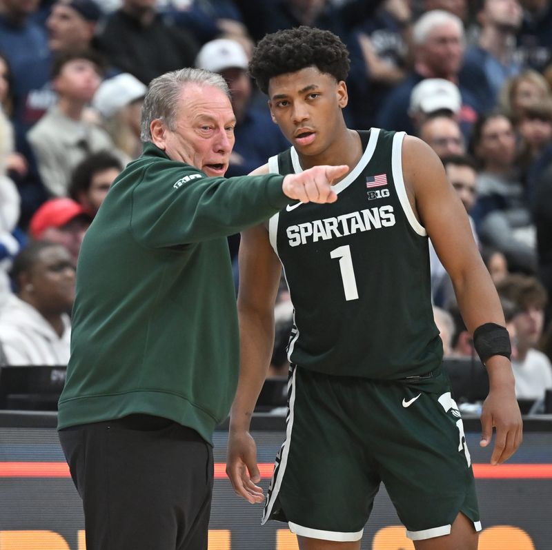 Michigan State coach Tom Izzo and guard Jeremy Fears Jr. during a break in the action against Connecticut in the second half of the Sweet Sixteen at Capital One Arena in Washington D.C, on March 28, 2026.